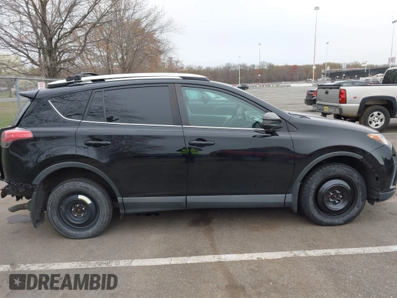 2016 Toyota RAV4 LE with VIN 2T3BFREV3GW447802, listed as a IAAI auction lot 41985438 with 213,247 mi miles. Bid and sale history available at carsss.com. Image 13.