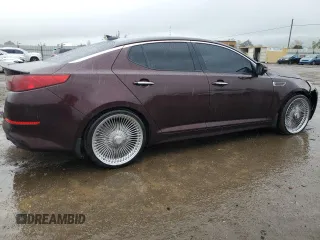 2014 Kia Optima EX with VIN 5XXGN4A79EG329448, listed as a Copart auction lot 50991095 with 103,879 mi miles and Salvage Title. Bid and sale history available at carsss.com. Image 3.
