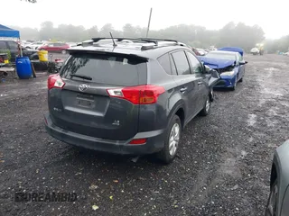2015 Toyota RAV4 LE with VIN JTMBFREV4FD153207, listed as a IAAI auction lot 42518542 with 56,505 mi miles and . Bid and sale history available at DreamBid. Image 4.