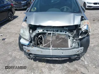 2010 Toyota Yaris with VIN JTDKT4K31A5318793, listed as a IAAI auction lot 39910045 with 192,737 mi miles. Bid and sale history available at carsss.com. Image 6.