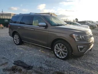 2019 Ford Expedition Platinum with VIN 1FMJU1LTXKEA56503, listed as a Copart auction lot 45657785 with 104,839 mi miles and Salvage Title. Bid and sale history available at carsss.com. Image 4.
