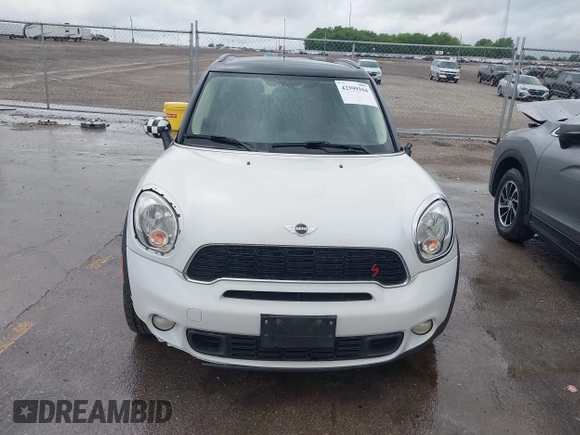 2013 MINI Countryman S ALL4 with VIN WMWZC5C50DWP30199, listed as a IAAI auction lot 42399104 with 103,367 mi miles and . Bid and sale history available at DreamBid. Image 6.