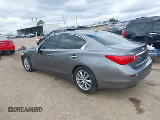 2014 Infiniti Q50 Sport with VIN JN1BV7AP5EM676199, listed as a IAAI auction lot 41721851 with 133,082 mi miles and . Bid and sale history available at DreamBid. Image 3.