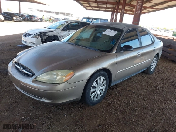 2002 Ford Taurus LX with VIN 1FAFP52U72G284116, listed as a IAAI auction lot 42004075 with 86,544 mi miles. Bid and sale history available at carsss.com. Image 17.