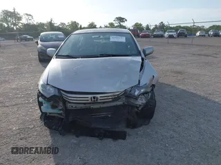 2010 Honda Insight LX with VIN JHMZE2H55AS039854, listed as a IAAI auction lot 42086147 with 153,555 mi miles and . Bid and sale history available at DreamBid. Image 12.