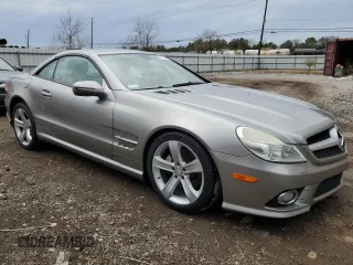 2009 Mercedes-Benz SL 550 with VIN WDBSK71F49F143492, listed as a Copart auction lot 88757425 with 89,117 mi miles and Salvage title. Bid and sale history available at DreamBid. Image 4.
