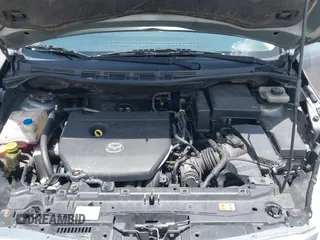 2012 Mazda 5 Sport with VIN JM1CW2BL8C0129591, listed as a IAAI auction lot 42513037 with 177,206 mi miles and . Bid and sale history available at DreamBid. Image 10.