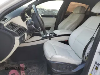2012 BMW X6 50i z VIN 5UXFG8C59CL590549, wystawiony jako Copart lot #53071175 z przebiegiem 67 390 mil mil oraz Szkoda całkowita • Salvage title. Historia ofert i sprzedaży dostępna na DreamBid. Obrazek 7.