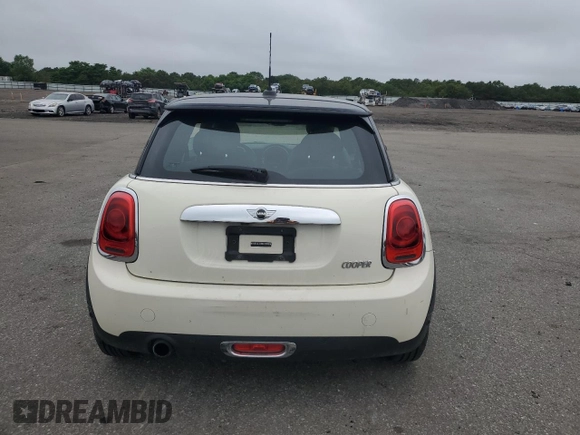 2014 MINI Hardtop with VIN WMWXM5C53ET936172, listed as a Copart auction lot 64183805 with 44,783 mi miles and Salvage title. Bid and sale history available at DreamBid. Image 6.