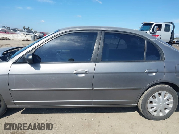 2004 Honda Civic LX with VIN 2HGES16654H579927, listed as a IAAI auction lot 41911814 with 233,803 mi miles. Bid and sale history available at carsss.com. Image 14.