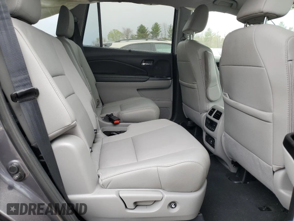 2020 Honda Pilot Touring 7-Passenger z VIN 5FNYF6H69LB005829, wystawiony jako Copart lot #52702555 z przebiegiem 90 746 mil mil oraz Szkoda całkowita • Salvage title. Historia ofert i sprzedaży dostępna na DreamBid. Obrazek 11.