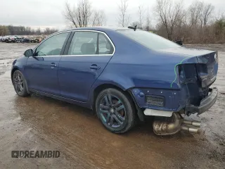 2006 Volkswagen Jetta z VIN 3VWRG81K06M785950, wystawiony jako Copart lot #87218214 z przebiegiem 129 955 mil mil oraz Szkoda całkowita • Salvage title. Historia ofert i sprzedaży dostępna na DreamBid. Obrazek 2.