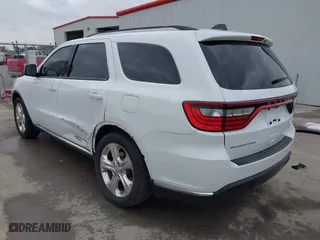 2014 Dodge Durango Limited with VIN 1C4RDHDG2EC318144, listed as a IAAI auction lot 41712791 with 124,569 mi miles. Bid and sale history available at carsss.com. Image 3.