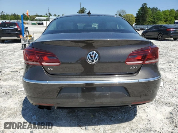2013 Volkswagen CC Lux with VIN WVWRN7AN4DE546711, listed as a Copart auction lot 52673205 with 106,700 mi miles and Salvage Title. Bid and sale history available at DreamBid. Image 6.