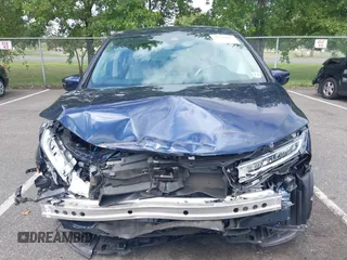 2022 Honda Odyssey EX-L with VIN 5FNRL6H70NB053843, listed as a IAAI auction lot 40210685 with 21,571 mi miles and . Bid and sale history available at DreamBid. Image 13.