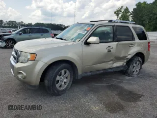 2010 Ford Escape Limited with VIN 1FMCU0EG6AKD42285, listed as a Copart auction lot 57087035 with 192,854 mi miles and Salvage title. Bid and sale history available at DreamBid. Image 1.