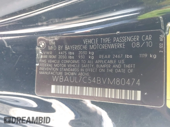 2011 BMW 1 Series 128i with VIN WBAUL7C54BVM80474, listed as a IAAI auction lot 42031032 with 76,617 mi miles and . Bid and sale history available at carsss.com. Image 9.