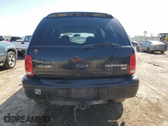 2003 Dodge Durango SLT z VIN 1D4HS48Z33F591372, wystawiony jako Copart lot #51596005 z przebiegiem 175 039 mil mil oraz Szkoda całkowita • Salvage title. Historia ofert i sprzedaży dostępna na DreamBid. Obrazek 6.