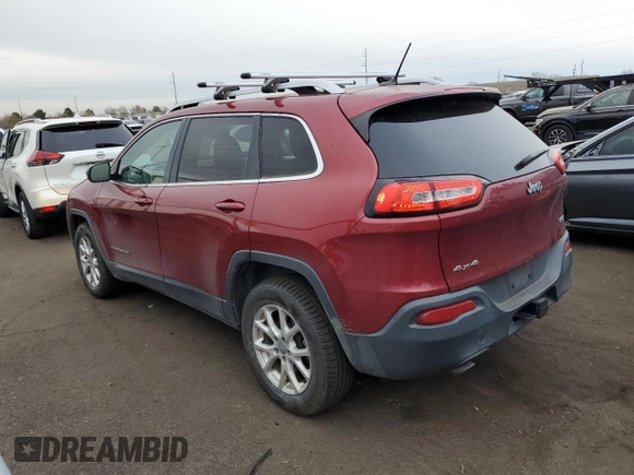 2014 Jeep Cherokee Altitude with VIN 1C4PJMCSXEW124863, listed as a Copart auction lot 82432534 with 194,559 mi miles and Salvage Title. Bid and sale history available at carsss.com. Image 2.