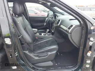 2018 Jeep Grand Cherokee Laredo E with VIN 1C4RJFAG5JC280033, listed as a IAAI auction lot 41953744 with 69,269 mi miles and . Bid and sale history available at DreamBid. Image 5.