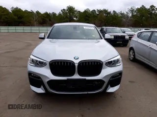 2021 BMW X4 xDrive30i z VIN 5UX2V1C06M9F10870, wystawiony jako Copart lot #37548973 z przebiegiem 13 840 mil mil oraz . Historia ofert i sprzedaży dostępna na DreamBid. Obrazek 5.