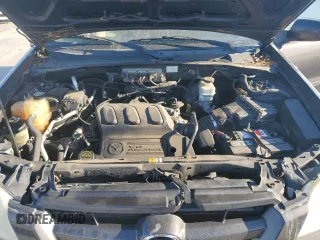2006 Mazda Tribute S with VIN 4F2YZ04106KM28191, listed as a Copart auction lot 83150994 with 126,536 mi miles and Clean Title. Bid and sale history available at DreamBid. Image 12.
