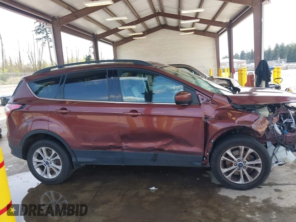 2018 Ford Escape SEL with VIN 1FMCU9HD0JUC36389, listed as a IAAI auction lot 41997627 with 96,739 mi miles. Bid and sale history available at carsss.com. Image 14.
