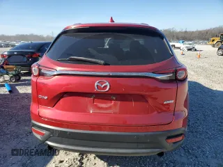 2017 Mazda CX-9 Touring z VIN JM3TCACY2H0135236, wystawiony jako Copart lot #86607184 z przebiegiem 81 947 mil mil oraz Szkoda całkowita • Salvage title. Historia ofert i sprzedaży dostępna na DreamBid. Obrazek 6.