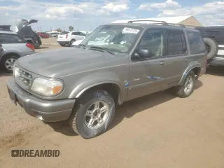 2000 Ford Explorer z VIN 1FMDU85P5YZC39251, wystawiony jako Copart lot #65672725 z przebiegiem 184 505 mil mil oraz Czysty tytuł • Clean title. Historia ofert i sprzedaży dostępna na DreamBid. Obrazek 1.