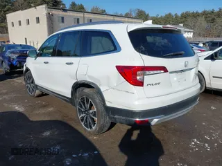 2020 Honda Pilot Elite with VIN 5FNYF6H09LB039247, listed as a IAAI auction lot 41364383 with 56,865 mi miles and . Bid and sale history available at DreamBid. Image 3.