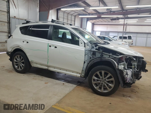 2016 Toyota RAV4 Limited with VIN JTMDJREV9GD014991, listed as a Copart auction lot 61238115 with Not provided miles and Salvage title. Bid and sale history available at DreamBid. Image 4.