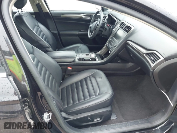 2019 Ford Fusion Hybrid SEL with VIN 3FA6P0MU1KR202860, listed as a IAAI auction lot 41983299 with 133,671 mi miles. Bid and sale history available at carsss.com. Image 5.