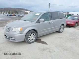 2014 Chrysler Town & Country Touring z VIN 2C4RC1BG8ER218358, wystawiony jako IAAI lot #41412291 z przebiegiem 142 403 mil mil oraz . Historia ofert i sprzedaży dostępna na DreamBid. Obrazek 2.