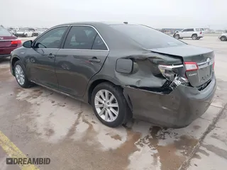 2014 Toyota Camry Hybrid LE with VIN 4T1BD1FK8EU102685, listed as a IAAI auction lot 41469306 with 91,606 mi miles. Bid and sale history available at carsss.com. Image 3.