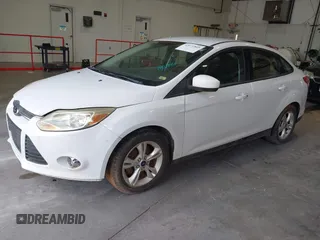 2012 Ford Focus SE with VIN 1FAHP3F23CL404590, listed as a IAAI auction lot 42671869 with 180,941 mi miles and . Bid and sale history available at DreamBid. Image 2.