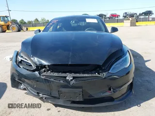 2023 Tesla Model S with VIN 5YJSA1E54PF531021, listed as a IAAI auction lot 42014104 with Not provided miles and . Bid and sale history available at DreamBid. Image 12.