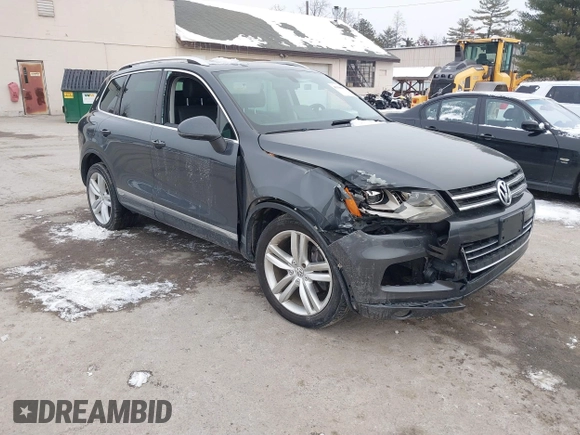 2012 Volkswagen Touareg Sport z VIN WVGEF9BP4CD008517, wystawiony jako IAAI lot #41386971 z przebiegiem 179 306 mil mil oraz . Historia ofert i sprzedaży dostępna na DreamBid. Obrazek 1.
