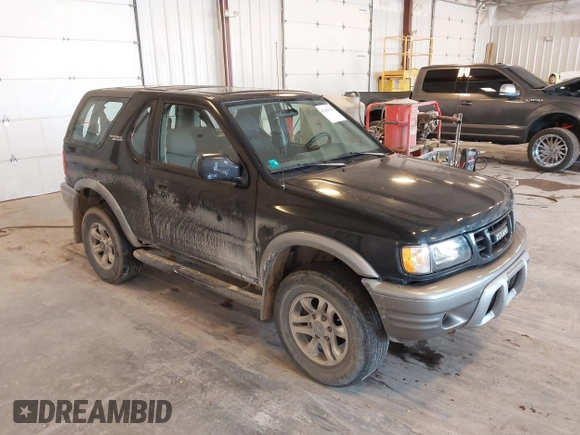 2002 Isuzu Rodeo with VIN 4S2CM57W124335034, listed as a IAAI auction lot 42446556 with 214,718 mi miles and . Bid and sale history available at DreamBid. Image 1.