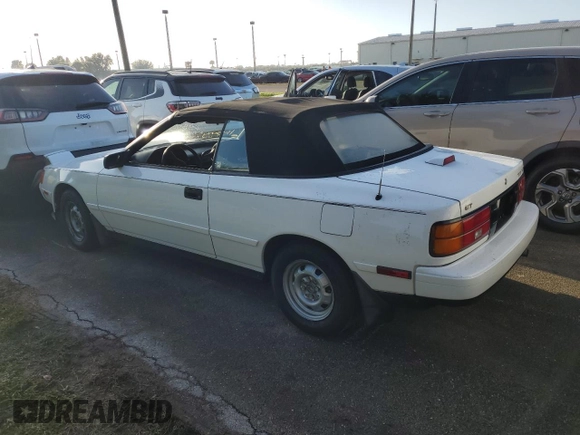 1989 Toyota Celica z VIN JT5ST62K8K7343548, wystawiony jako Copart lot #73774594 z przebiegiem 87 477 mil mil oraz Szkoda całkowita • Salvage title. Historia ofert i sprzedaży dostępna na DreamBid. Obrazek 2.