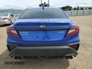 2023 Subaru WRX Premium with VIN JF1VBAF65P9824749, listed as a Copart auction lot 52210825 with 4,965 mi miles and Salvage title. Bid and sale history available at DreamBid. Image 6.