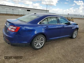 2013 Ford Taurus Limited with VIN 1FAHP2F86DG100713, listed as a Copart auction lot 52599085 with 168,771 mi miles and Salvage title. Bid and sale history available at DreamBid. Image 3.