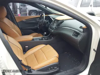 2014 Chevrolet Impala LTZ with VIN 1G1155S38EU105260, listed as a IAAI auction lot 42012082 with 230,407 mi miles. Bid and sale history available at carsss.com. Image 5.