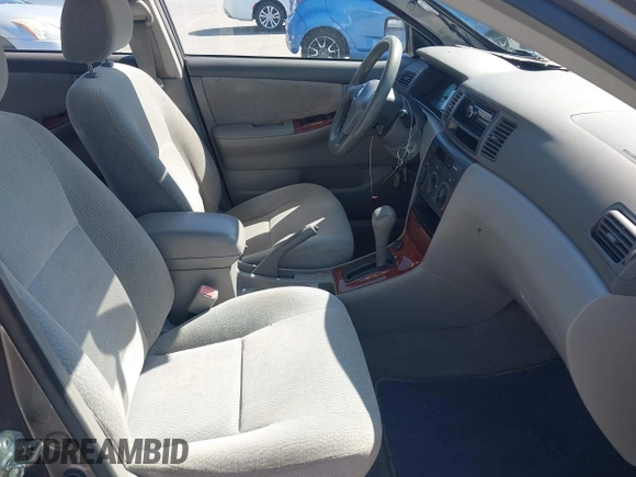 2004 Toyota Corolla CE with VIN 1NXBR32E64Z303089, listed as a IAAI auction lot 42147550 with 232,062 mi miles. Bid and sale history available at carsss.com. Image 5.