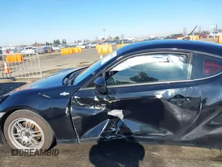 2014 Scion FR-S z VIN JF1ZNAA18E9700718, wystawiony jako IAAI lot #40958319 z przebiegiem 104 010 mil mil oraz . Historia ofert i sprzedaży dostępna na DreamBid. Obrazek 6.