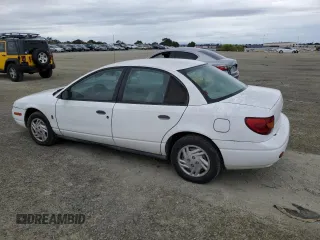 2001 Saturn SL with VIN 1G8ZF52891Z237485, listed as a Copart auction lot 76174574 with 130,525 mi miles and Salvage title. Bid and sale history available at DreamBid. Image 2.