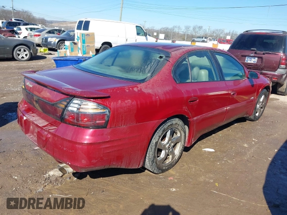 2003 Pontiac Bonneville SLE z VIN 1G2HY52K534159881, wystawiony jako IAAI lot #41604988 z przebiegiem 227 097 mil mil oraz . Historia ofert i sprzedaży dostępna na DreamBid. Obrazek 4.