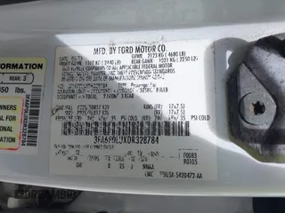 2013 Ford Fusion SE Hybrid with VIN 3FA6P0LUXDR328784, listed as a IAAI auction lot 42231399 with 169,462 mi miles and . Bid and sale history available at carsss.com. Image 9.