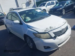 2009 Toyota Corolla with VIN 1NXBU40E59Z070160, listed as a IAAI auction lot 41887778 with 185,133 mi miles. Bid and sale history available at carsss.com. Image 1.