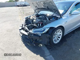 2016 Tesla Model S 90D with VIN 5YJSA1E22GF174637, listed as a IAAI auction lot 42234083 with 142,915 mi miles and . Bid and sale history available at DreamBid. Image 20.