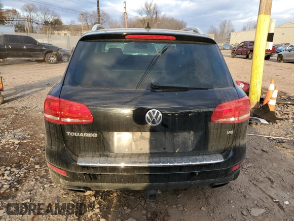 2012 Volkswagen Touareg Sport z VIN WVGEF9BP7CD006020, wystawiony jako Copart lot #88211145 z przebiegiem 180 729 mil mil oraz Szkoda całkowita • Salvage title. Historia ofert i sprzedaży dostępna na DreamBid. Obrazek 6.